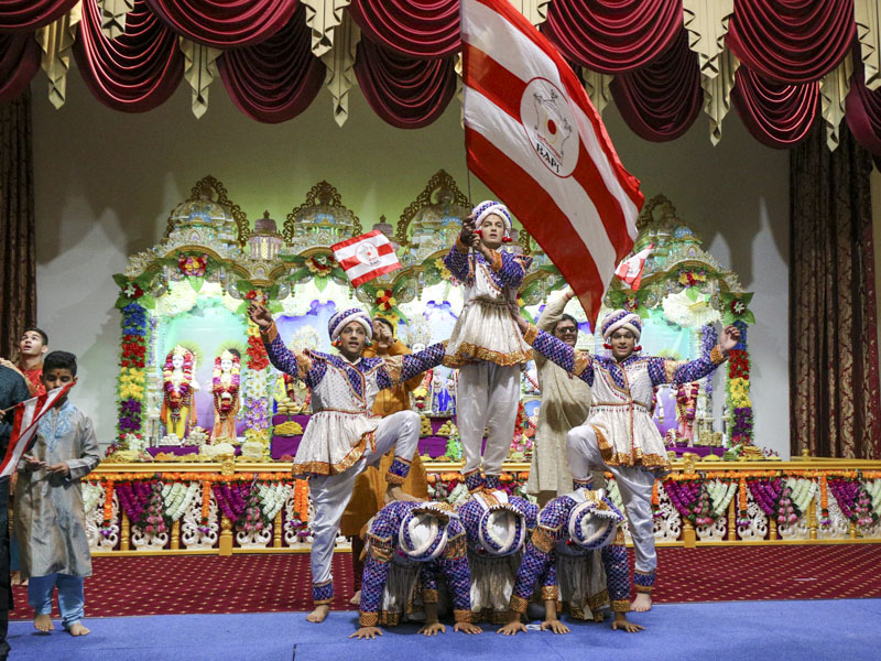 Children perform a cultural dance