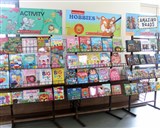 Books on display and students 