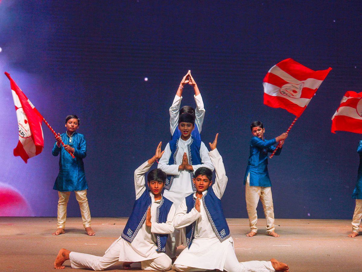 Children perform a traditional dance 