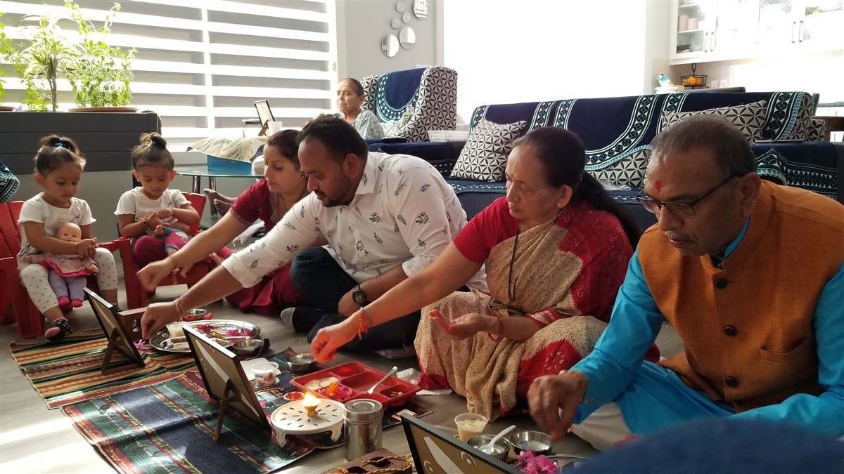 Devotees participating in the Shilayas Vidhi from their home