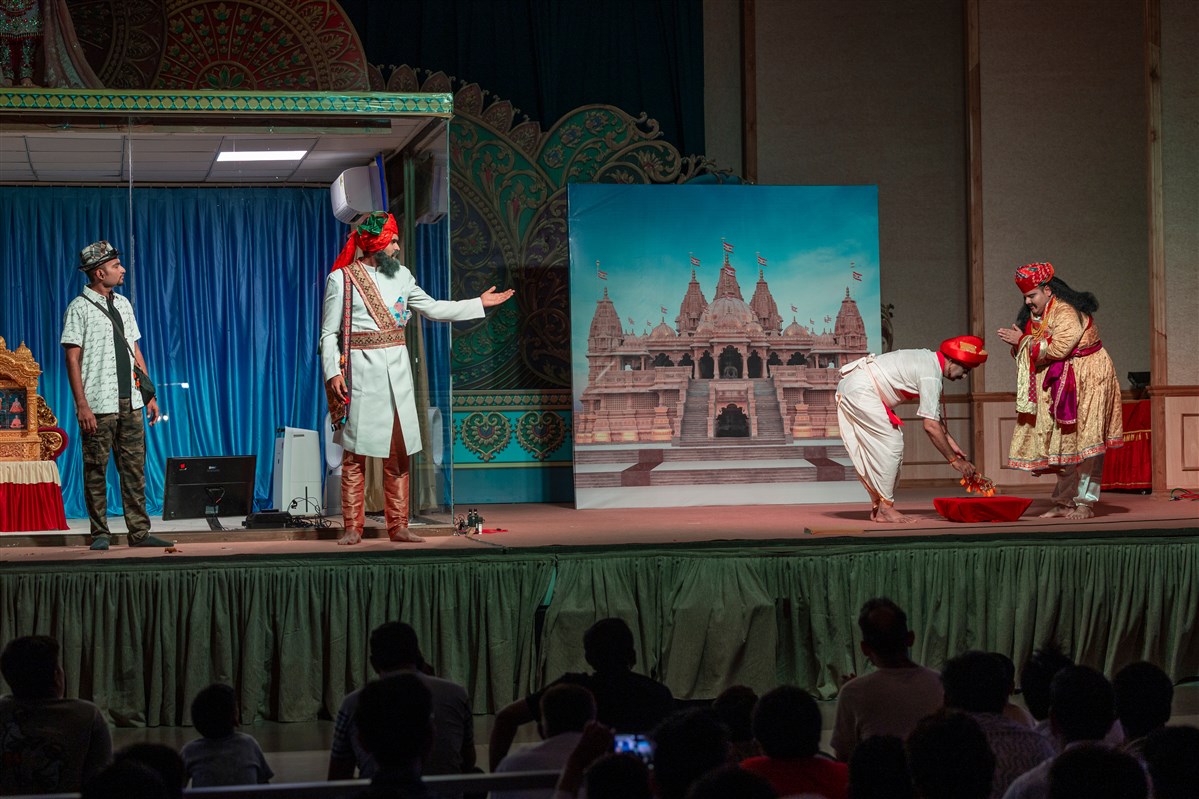 Youths and devotees perform a cultural program