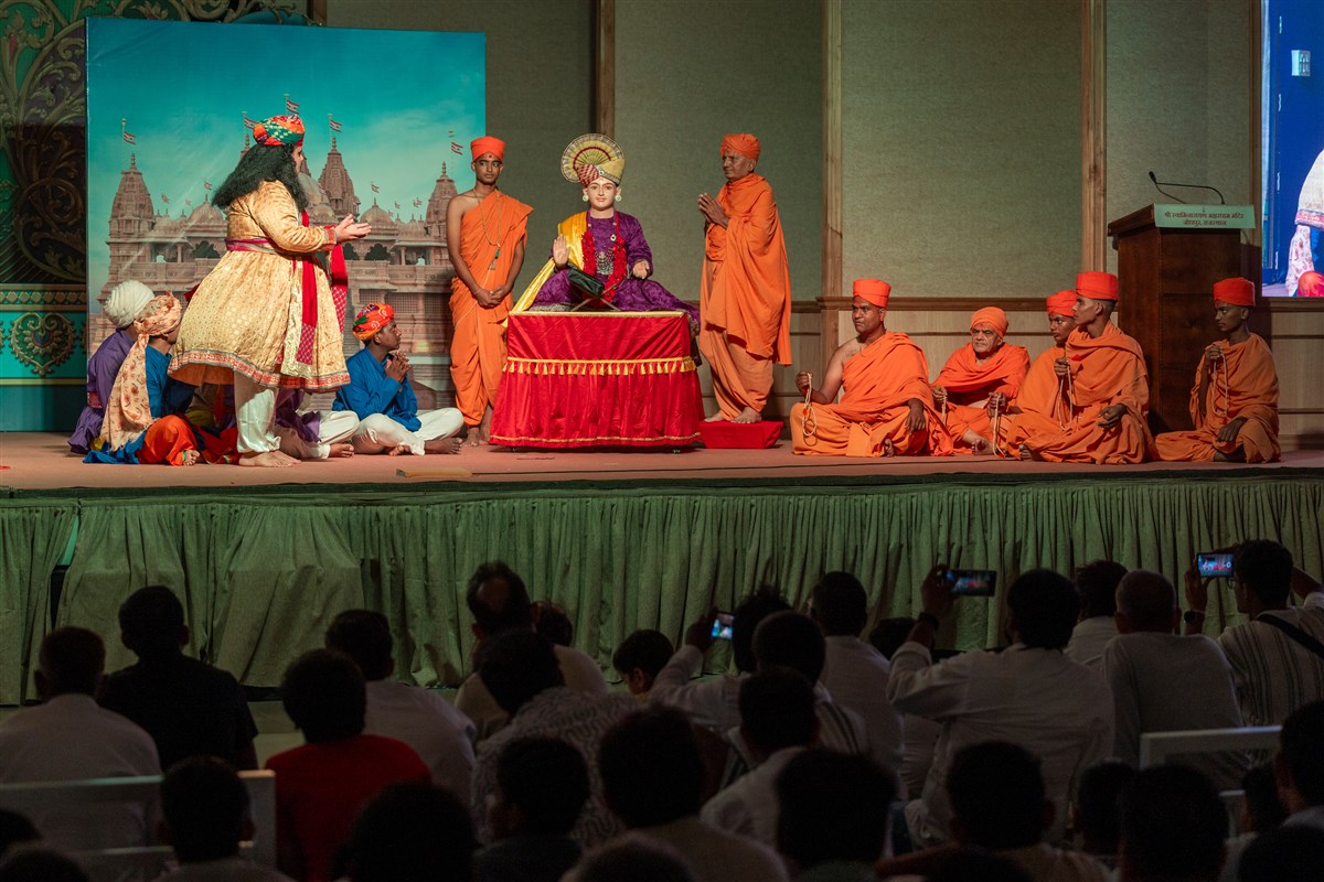 Youths and devotees perform a cultural program