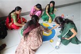 School Staff doing Rangoli, BAPS SVM JND