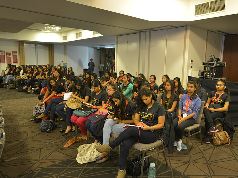Delegates enjoying the convention session and taking notes 