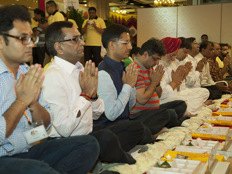 Devotees participate in mahapuja rituals at the Hong Kong mandir